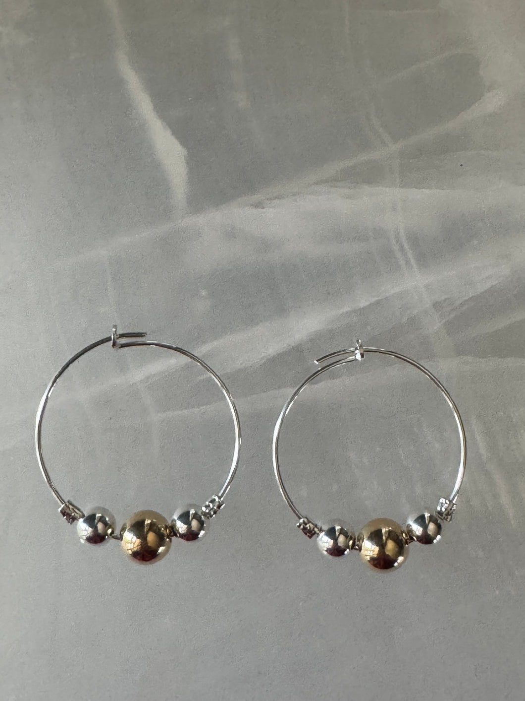 Sterling silver and gold hoops