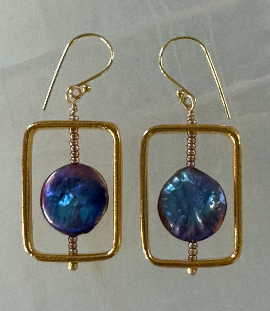 Gold square hoops with peacock blue pearls