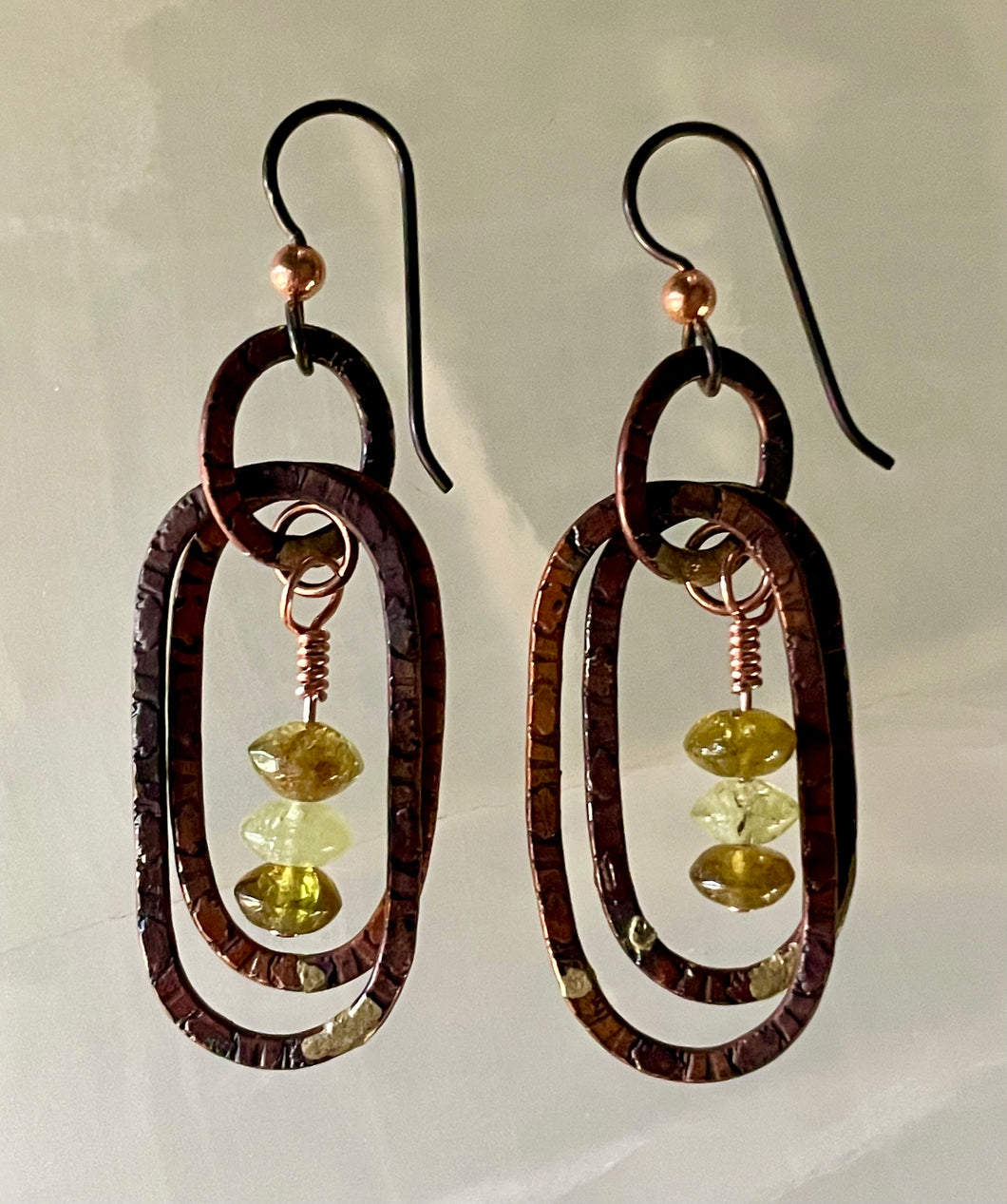 NEW EARRINGS! Fire-torched copper with green garnets