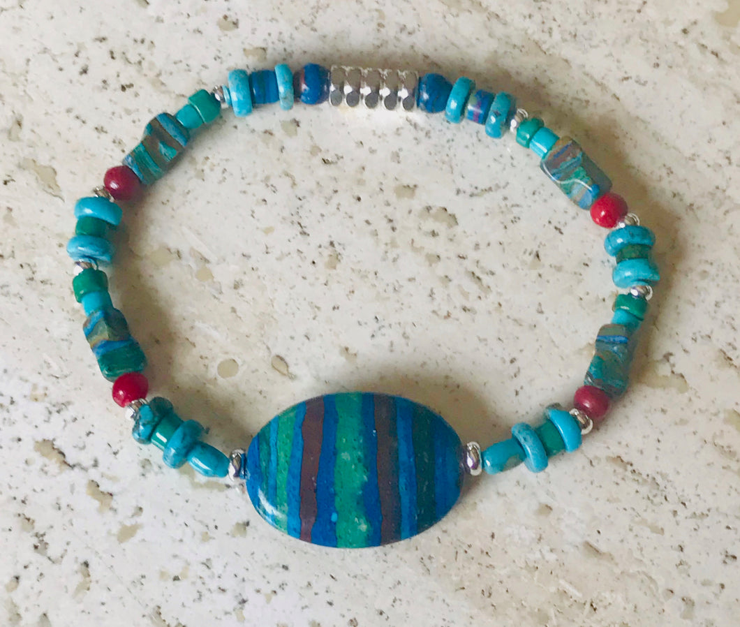 Woman's bracelet: Calcilica, turquoise, coral