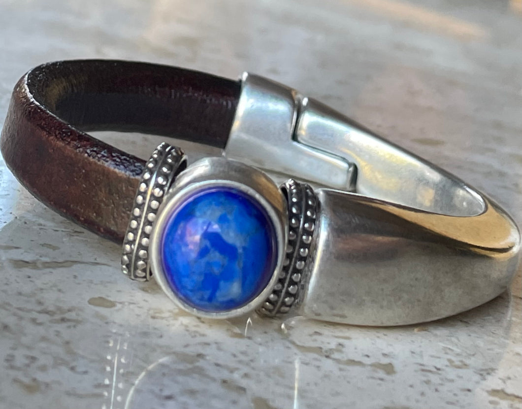 Woman's leather and silver plate cuff bracelet